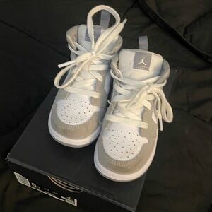 Jordan 1 Mid Sneakers in White and Gray